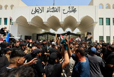 Iraqi judiciary resumes work as political crisis ensues