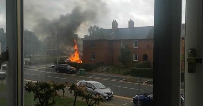 Car bursts into flames after ploughing into house in Scots town as emergency crews race to scene