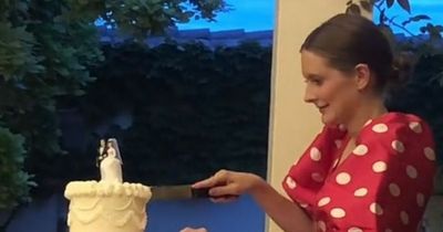 Wedding guests left in disbelief as woman cuts cake before bride and groom