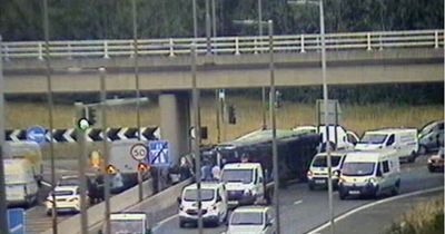 Lorry overturns in rush hour crash on M8 as emergency services race to scene