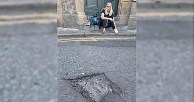 Mum's fury as she breaks both ankles and is left in 'excruciating pain' after falling in pothole