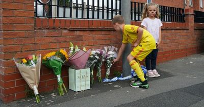 Children hold hands as tributes grow for 'little angel' Olivia Pratt-Korbel