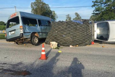 Four hurt in pickup truck-school van crash