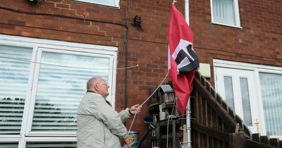 Ex-soldier takes down Nazi flag after backlash from disgusted neighbours