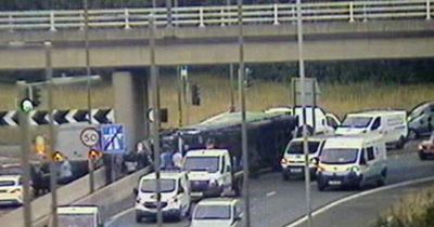 Lorry driver dies after HGV overturns in rush hour tragedy on M8 in Edinburgh
