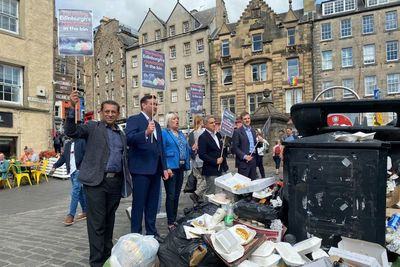 'Brass neck' Unionists heckled as public see through bin strike photo op