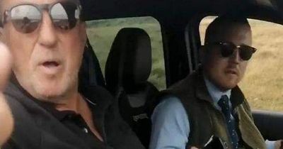 Cricket legend Sir Ian Botham met by masked protestors while grouse hunting