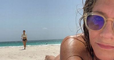 Jennifer Aniston sends fans into a frenzy as she stuns in sizzling string bikini