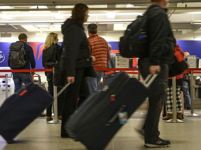 A baby is reunited with her family after she was found with a woman at an airport