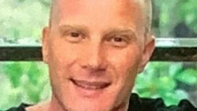 Two men charged with murder of Andrew Walsh, whose body was found in a concrete slab at Brisbane transport depot