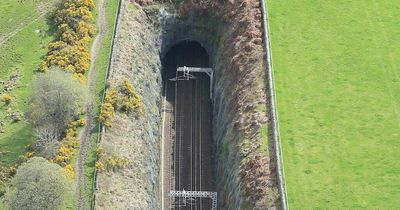 Trains delayed for two more days as engineers continue to assess risk of cliff face crumbling