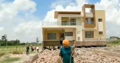 Farmer told to demolish dream home for railway line moves it 500ft away on wheels