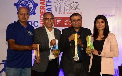 Nikhat unveils NMDC Hyderabad Marathon finishers’ medals