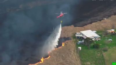 Water-bombers sent to out-of-control fire near Gulgong, as wet ground hampers RFS efforts