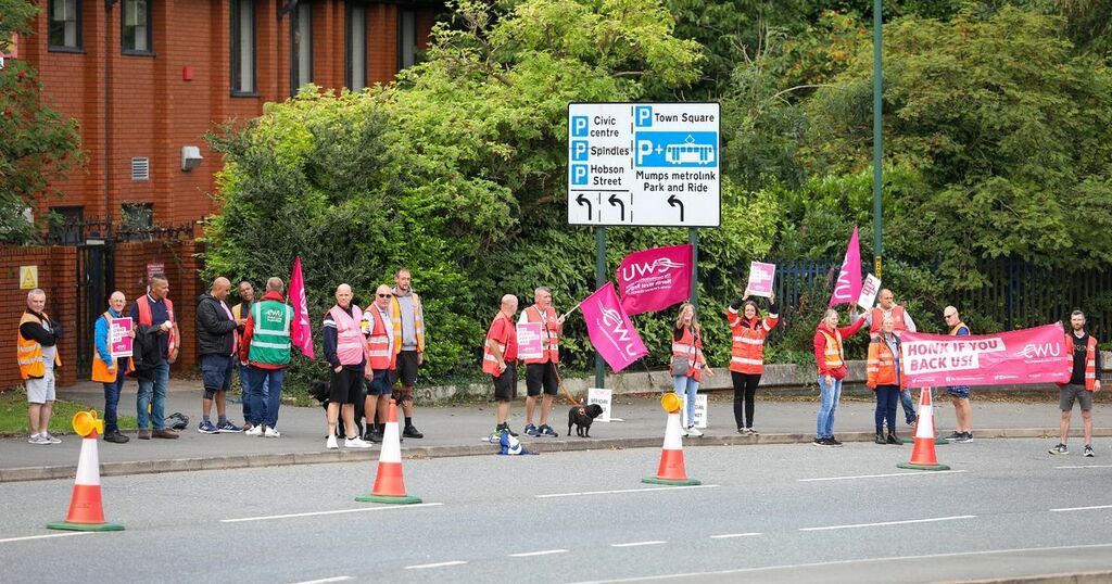 Royal Mail workers form picket line outside Oldham…
