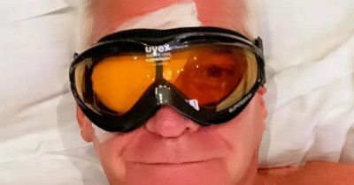 Phillip Schofield sleeps wearing ski goggles following surgery for 'debilitating' eye condition