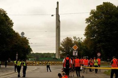 Watch as Latvia topples Soviet-era monument which paid tribute to the Red Army