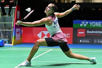 Marin vows to return to top after badminton worlds exit