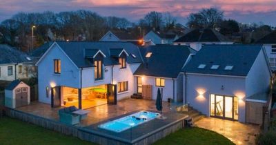 Party pad Pembrokeshire property with two hot tubs in the garden that used to be a 1960s bungalow