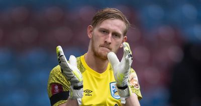 Ryan Schofield answers Hibs SOS keeper call after signing on loan from Huddersfield Town