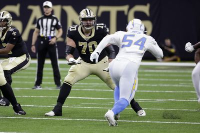 Rookie Saints left tackle Trevor Penning carted off vs. Chargers with left foot injury