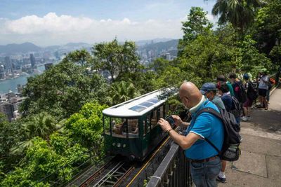 Peak Tram reopens in tourist-devoid Hong Kong