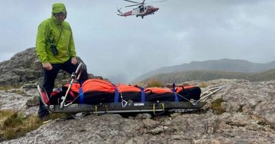 Group forced to spend night stuck up mountain with no phone signal after injury