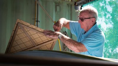 Cairns 'Men's Shed with barnacles' provides wooden boat builders with mateship and emotional support