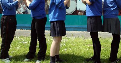 Schools in England 'break spirit of law' by making parents buy branded uniform