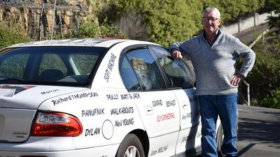 John Woodroffe records lifetime of people, places with car stickers on his eye-catching Holden Commodore