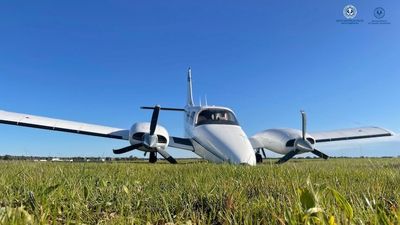 Four men escape injury after two separate landing dramas involving light planes in Adelaide