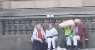 Edinburgh tourist fuming after shirtless street performer kisses him on lips