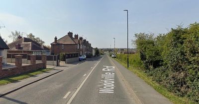 Police shut roads and urge people to stay away after 'grenade' found in garden