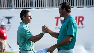 Golfer Rory McIlroy wins the Tour Championship by one shot to clinch the PGA Tour playoff title for record third time