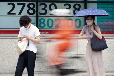 Asian shares slide on Wall Street drop that ended last week