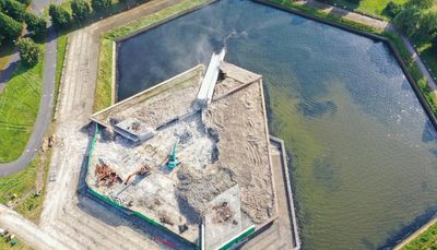 Massive Obelisk At Soviet WWII Memorial Is Toppled Into Pond With A Splash