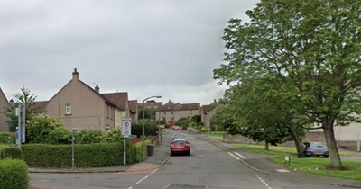 Edinburgh man rushed to hospital as police lockdown street over 'disturbance'