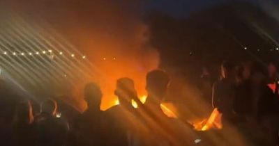 Reading Festival-goers leave after after tent fires, fighting and looting