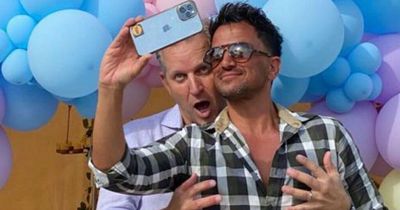 Peter Andre poses with reclusive celebrity Jeremy Kyle at glam party