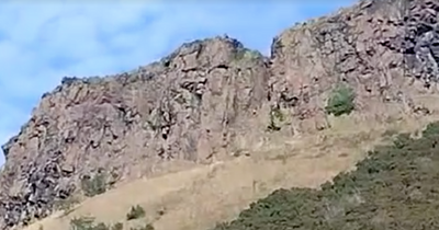 Edinburgh climber in shorts caught on camera scrambling 150ft up Salisbury Crags