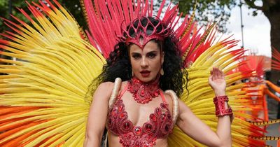 Notting Hill Carnival dancers hit the streets in fabulous feathers for comeback event