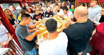 Man v Sausage: The Manchester eating competition in which contestants tackle 24-inch hot dogs