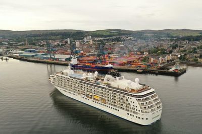 Huge luxury cruise ship with 165 private homes docks in Greenock during world tour