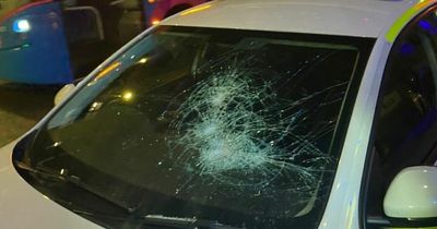 Police car windscreen left completely smashed by vandals during patrols at Manchester Pride