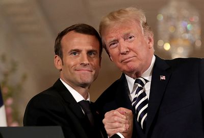 Trump brags he has "illicit" Macron dirt