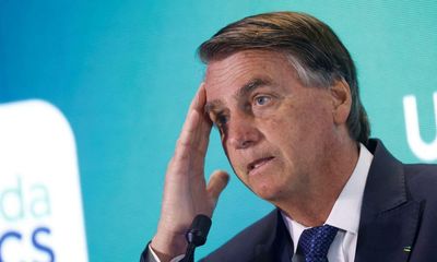 Bolsonaro under fire over claims family paid for 51 properties in cash