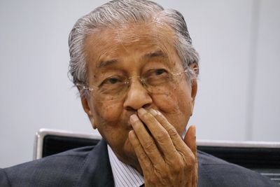 Malaysia's Mahathir, 97, in hospital after testing positive for COVID