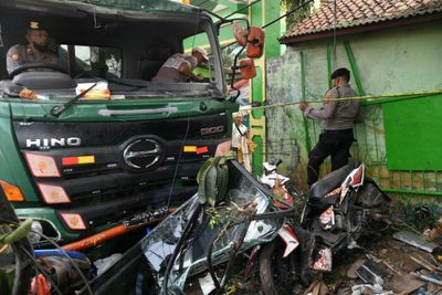 10 killed in Indonesia in truck crash outside school