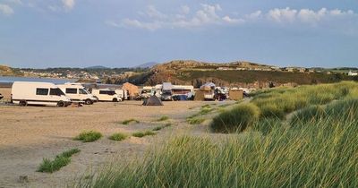 Motorhome owners 'ignore parking ban' on North Wales beach as tensions escalate