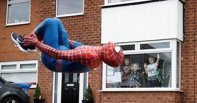 'Stockport Spider-Man' hailed a 'proper hero' after saving terrified boy, 4, from top of 50ft fairground slide